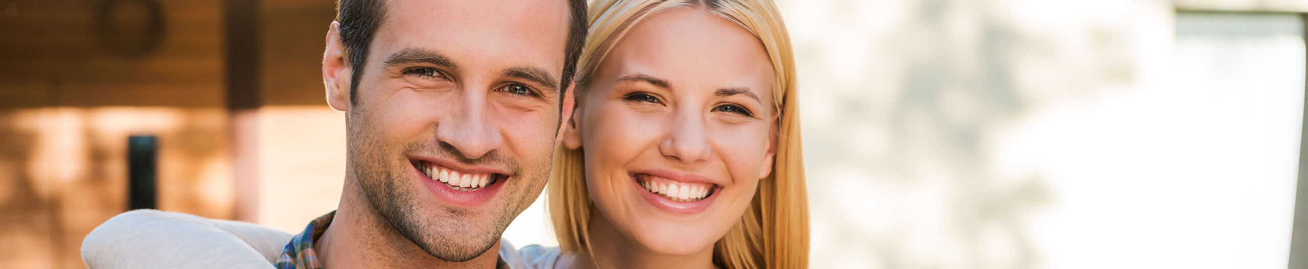 Young man and woman smiling