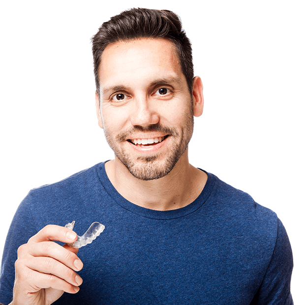 man holding clear aligner