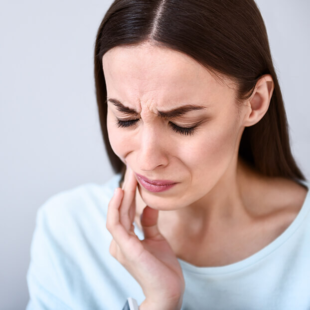 woman with tooth pain