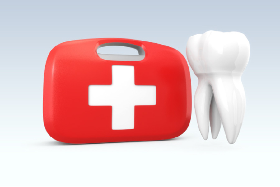 dental emergency first aid kit next to a tooth