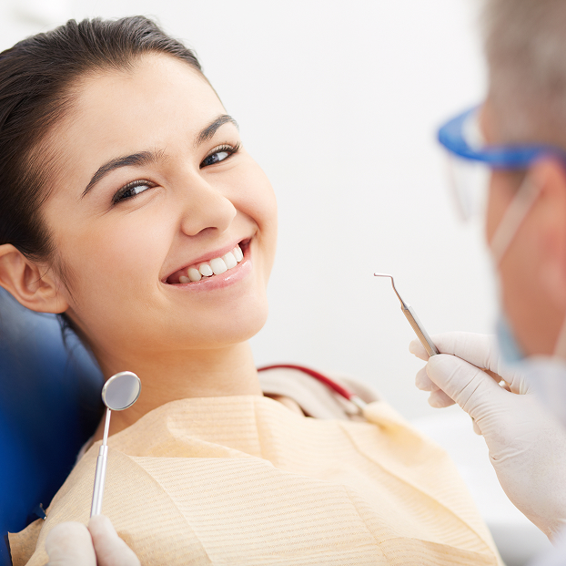 woman smiling at the dentist