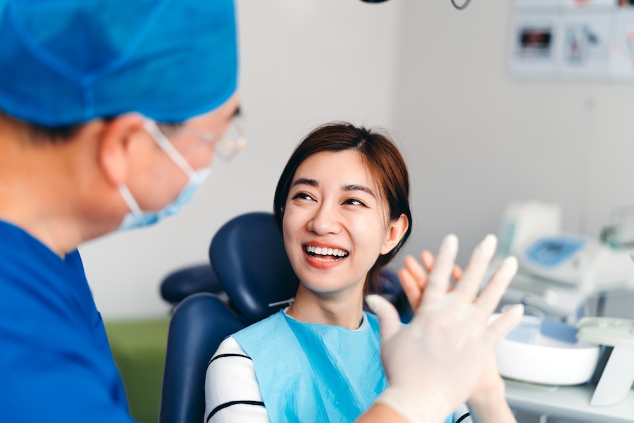 discussing dental bonding or dental crown at the dentist